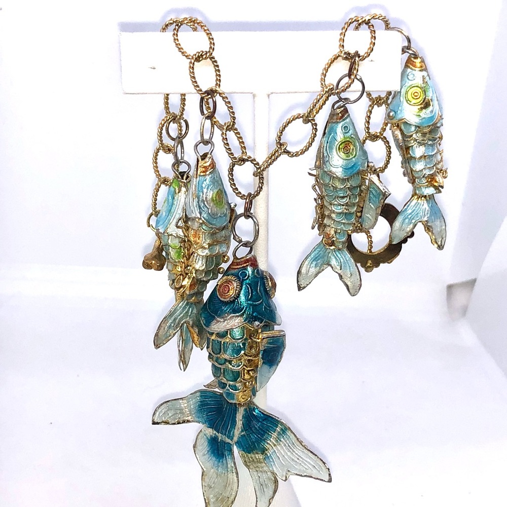 Gold colored chain bracelet with 5 teal cloisonne articulated koi.